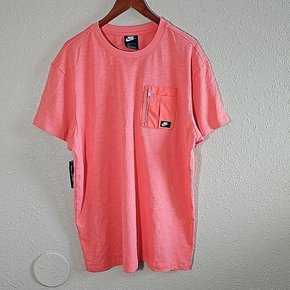 Nike Zip Pocket T-Shirt.